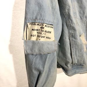 Jean Jacket super cool with a cut in the back